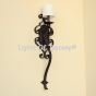 Hand forged wrought iron wall sconce with scrollwork
Spanish style wrought iron wall sconce
Rustic wrought iron wall light with decorative scrolls
Spanish Revival wrought iron wall sconce
Traditional hand forged iron wall sconce
Decorative