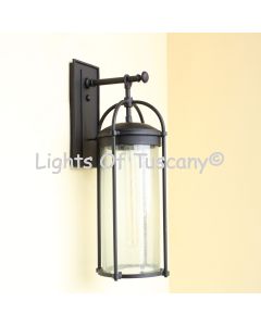 Wrought iron wall light,
Seeded glass outdoor light,
Black outdoor wall sconce,
Contemporary exterior lighting
Cylinder lantern wall mount
Outdoor lighting fixture,
Patio wall light,
Entryway wall lantern,
Sleek minimalist wall light,
Industrial-