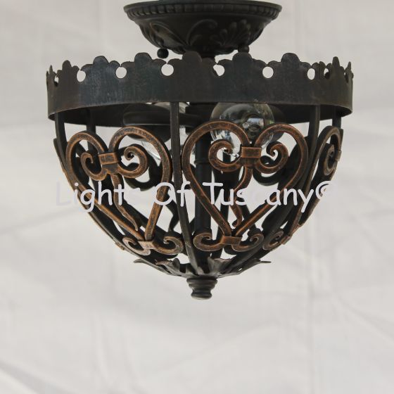 Tuscan ceiling flush mount light fixture.